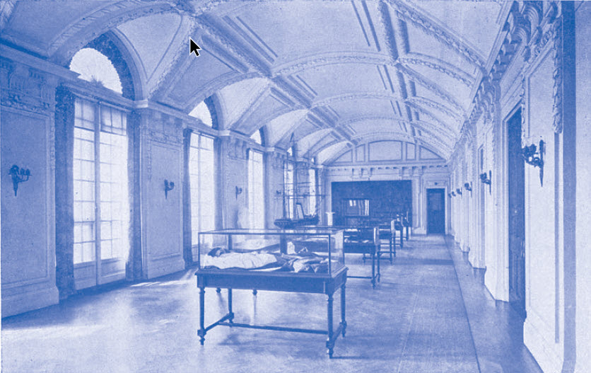 The antique mirror was bequeathed to this room by Mrs. S. V. white and the fire-back to the fireplace came from the Home of General Benjamin Lincoln, at Hingham, and was the gift of the Massachusetts Daughters. In the background is a model of the old frigate Constitution, which was present to the National Society by the District of Columbia Society of the Sons of the American Revolution.