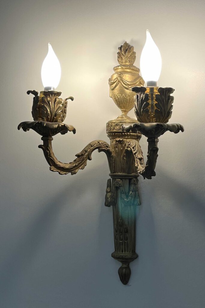 Sconces, wall-mounted fixtures, were also adapted for gas and electric lighting, offering a versatile lighting solution for various spaces.